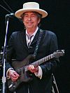 https://upload.wikimedia.org/wikipedia/commons/thumb/d/d5/Bob_Dylan_-_Azkena_Rock_Festival_2010_1.jpg/100px-Bob_Dylan_-_Azkena_Rock_Festival_2010_1.jpg